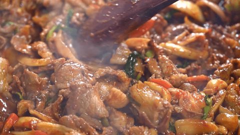 Korean traditional dish of stir-fried pork and assorted vegetables with gochujang - Gochujang Bulgogi Adlı Stok Video