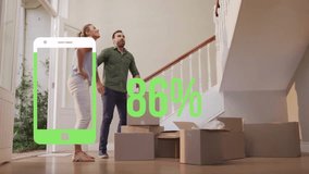 Animation of green smartphone and percent over caucasian couple with boxes moving in to new home. Property, ownership, finance and data processing concept digitally generated video. - Powered by Shutterstock - Get 15% off with code: PIKWIZARD15