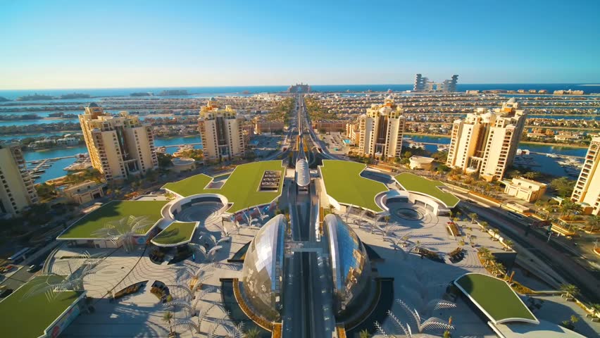 Aerial view of Dubai residential district with luxury villas at The Palm Jumeirah district with skyline in background, Dubai, United Arab Emirate Royalty-Free Stock Footage #3397743665