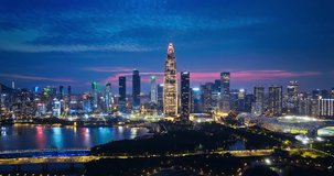 Aerial shot of Shenzhen Financial District skyline at night in Guangdong Province, China. Creative category video without architectural logos