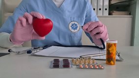 Doctor holding red heart with virus. Viral myocarditis with influenza - Powered by Shutterstock - Get 15% off with code: PIKWIZARD15