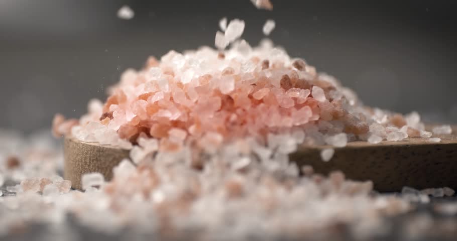 Himalayan pink salt in a super slow motion. Royalty-Free Stock Footage #3397940351