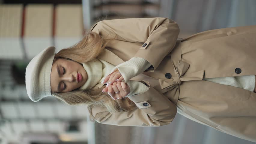A young woman froze standing on the street