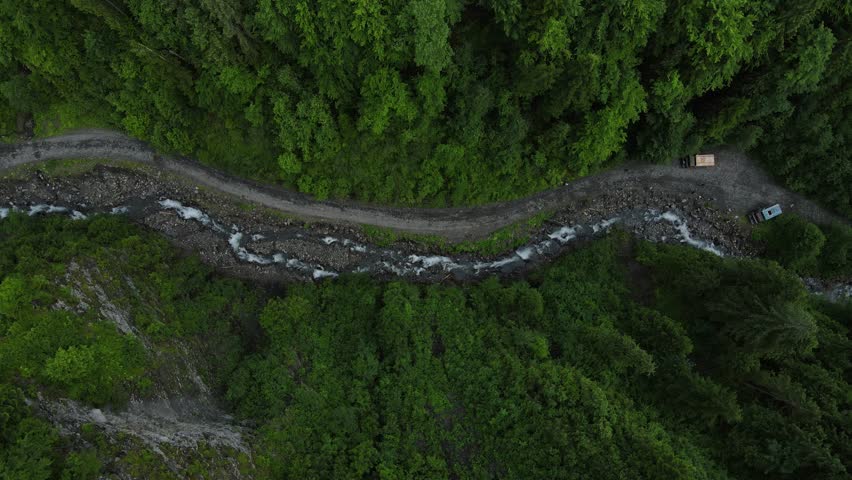 Rugged Routes: Aerial Insights of Drahobrat's Mountain Roads Royalty-Free Stock Footage #3398064953