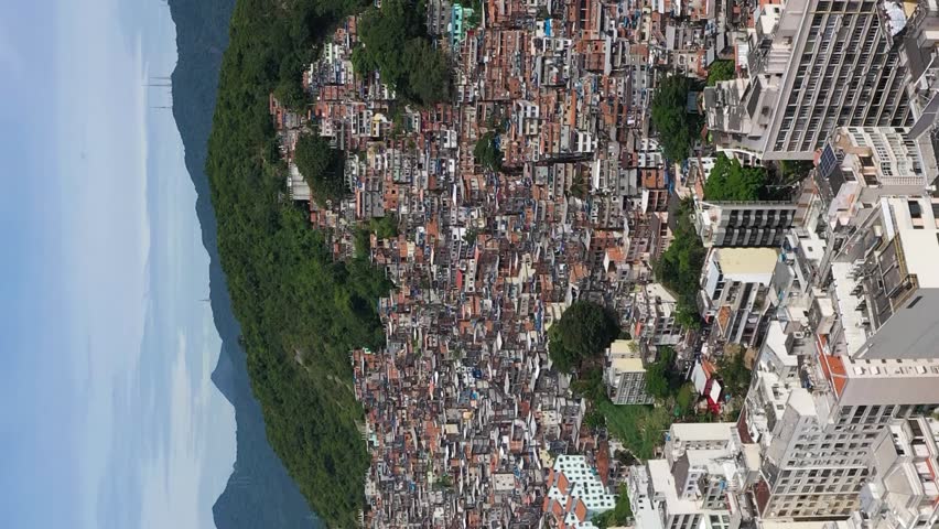 Cantagalo and Pavao-Pavaozinho Favelas. Rio de Janeiro, Brazil. Aerial View. Drone Flies Forward. Vertical Video Royalty-Free Stock Footage #3398115033