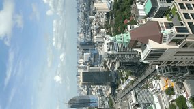 Vertical video. Aerial view of traffic in Bangkok downtown Thailand. 