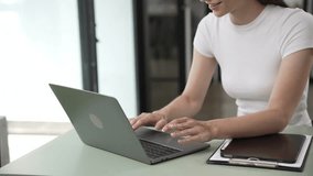 Gen Z young student girl in headphones studying internet at laptop Listen to audio narration Webinars Writing notes, listening to podcasts online, woman taking listening training course - Powered by Shutterstock - Get 15% off with code: PIKWIZARD15