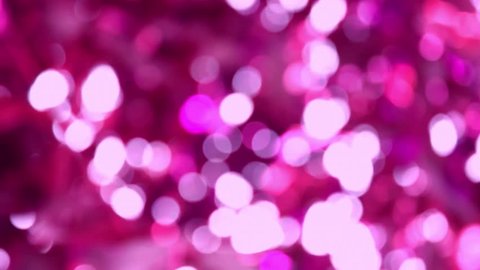 Abstract pink bokeh background, small light motion with in sunny back, circle, loopable footage. 1920x1080, Full HD. 