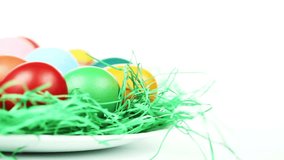 Easter Video Background - Easter eggs plate background, seamless loop, copy space included