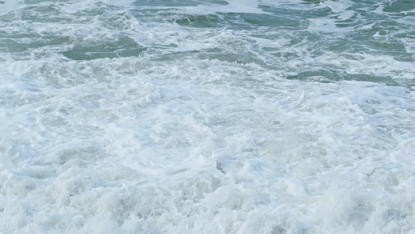 Waves And Sand At Tropical Beach. Beautiful Texture Of Big Power Dark Ocean Waves With White Wash. Slow motion. Royalty-Free Stock Footage #3398309523