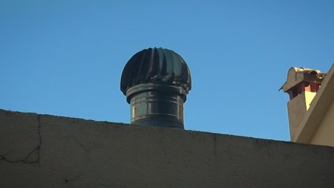 Spinning air ventilator on a roof