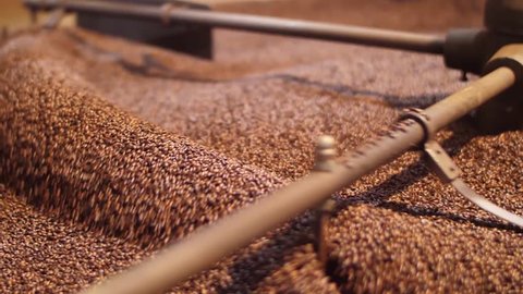 process of mixing and roasting coffee beans production slow motion