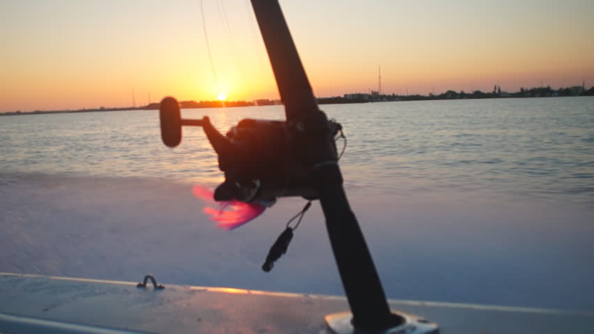 Saltwater fishing at sunrise in Florida Keys