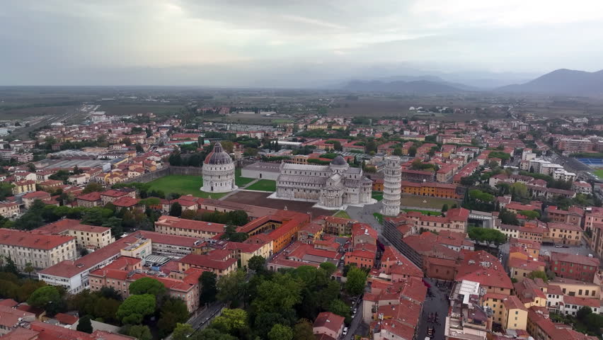 Pisa Cathedral and the Leaning Tower in Pisa, Italy. Cathedral with Leaning Tower of Pisa on Piazza dei Miracoli, Tuscany