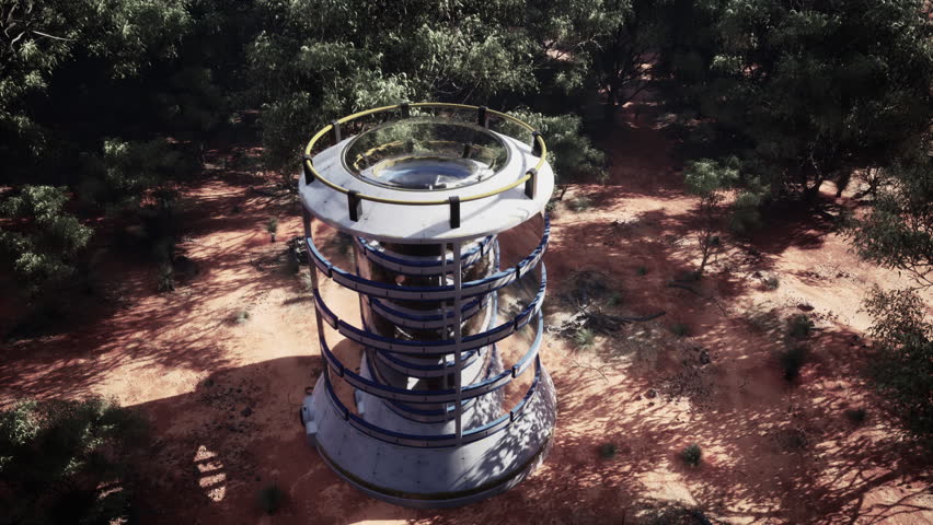 An aerial view of a tower in the middle of the desert
