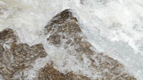 Close Up of Water Hitting Rocks