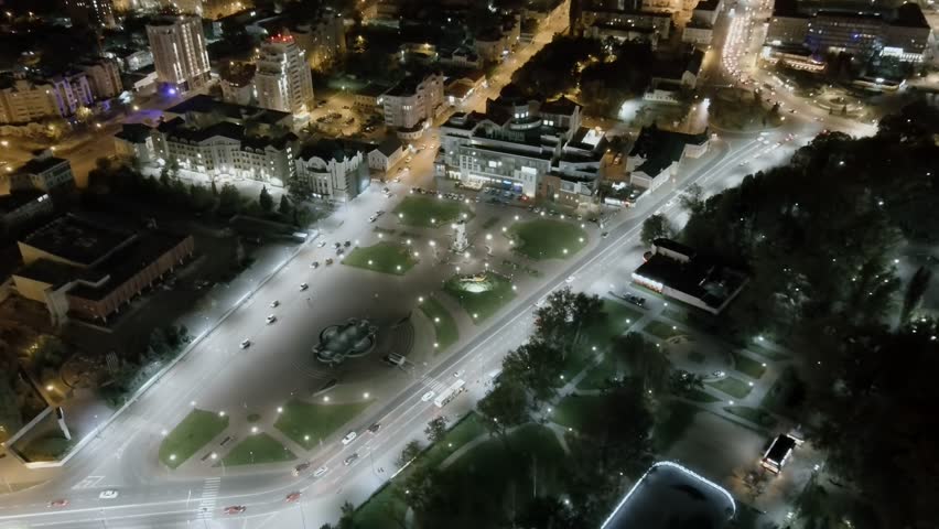 A-Log. Lipetsk, Russia. Peter the Great Square. Night city lights. Flight after sunset. History Center, Aerial View