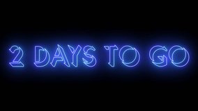 2 Days To Go neon glowing text animation in 4K. Neon-colored 2 Days To Go text with a glowing neon-colored moving outline on a dark background in 4K. Technology video material animation in 4K. 