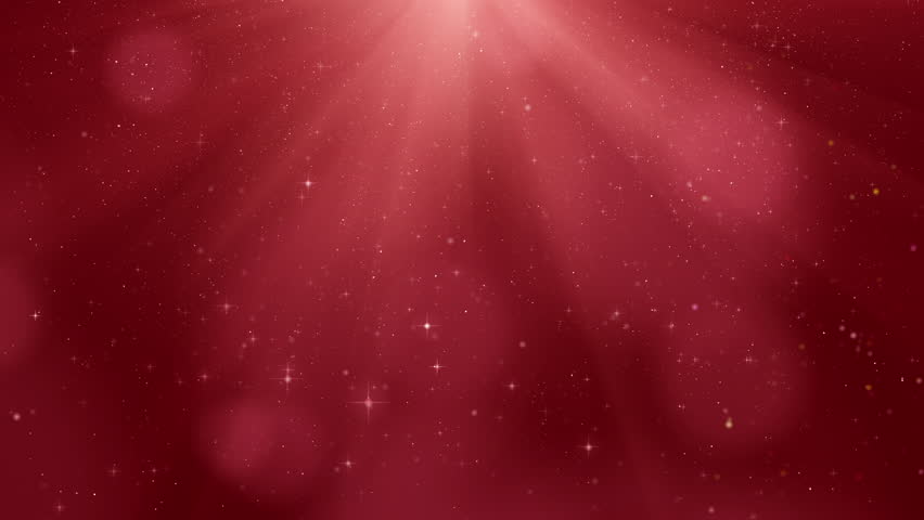 A red Christmas-themed background with an abstract shimmering, celestial rays that exude a divine blessing and the radiant glow of God's light. Flowing particles, loop of motion.