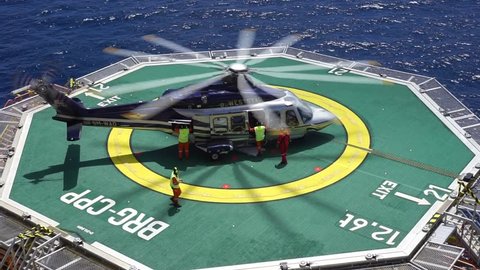 KELANTAN, MALAYSIA - NOVEMBER 16th, 2017 : Top view of a commercial helicopter Agusta Westland AW 139 ready to take off after taking offshore workers who signed off from duty at oil and gas platform.