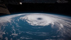 View of Planet Earth Surface with Huge Hurricane moving. View from Space Satellite. Solar Panels. Elements of this video furnished by NASA.
 - Powered by Shutterstock - Get 15% off with code: PIKWIZARD15