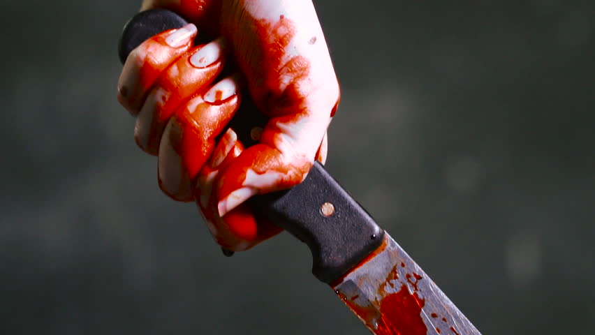 Bloody Knife. Hand Holds a Stock Footage Video (100% Royalty-free