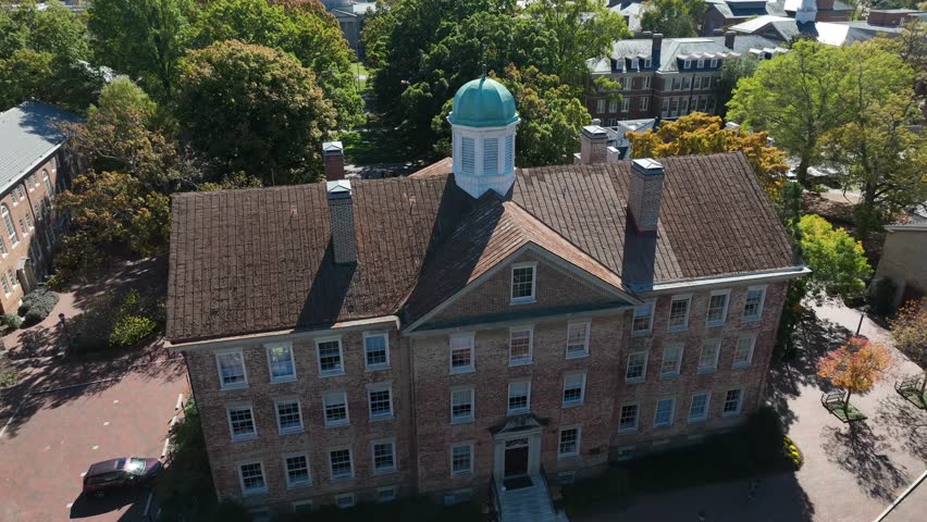 UNC College of Arts and Sciences building. Aerial reveal of University of North Carolina Chapel Hill campus during autumn.