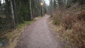 Effective running video filmed on gravel paved terrain course with trees and green framing. Wonderful feeling of running out in nature. GoranOfSweden