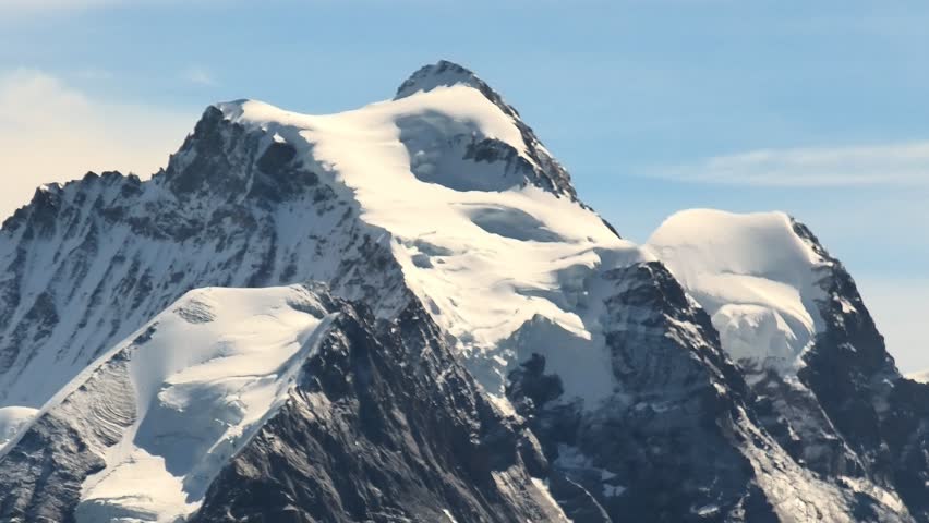 North face of Eiger snow capped seen from Schilthorn summit 2970 meters at panoramic platform. Murren, Canton of Bern in Switzerland. Oberland Bernese, Jungfrau Region. Summer season. Royalty-Free Stock Footage #3399378931