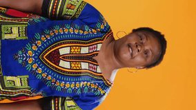 Vertical Video Tired husband and wife dealing with migraine on camera, being in pain and rubbing temples to ease tension. African american married couple feeling sick with painful headache, overworked - Powered by Shutterstock - Get 15% off with code: PIKWIZARD15