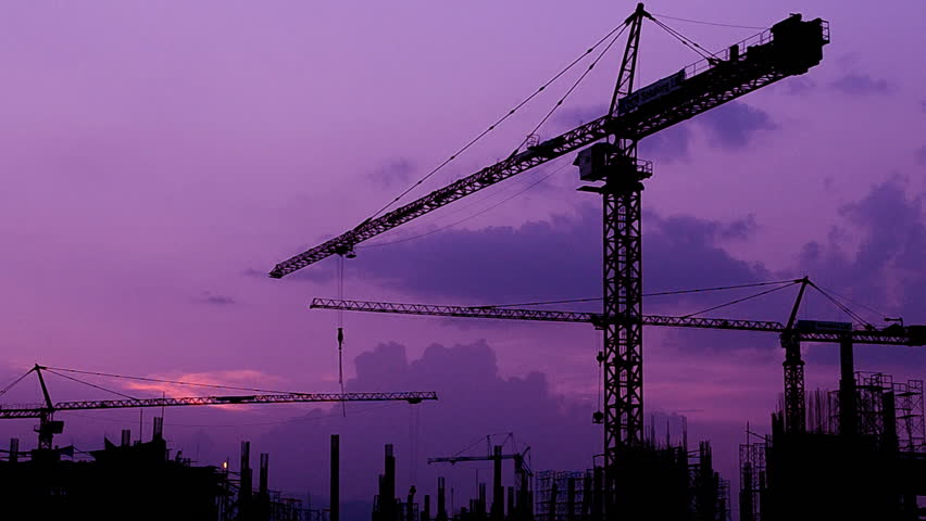 silhouette crane building and twilight time