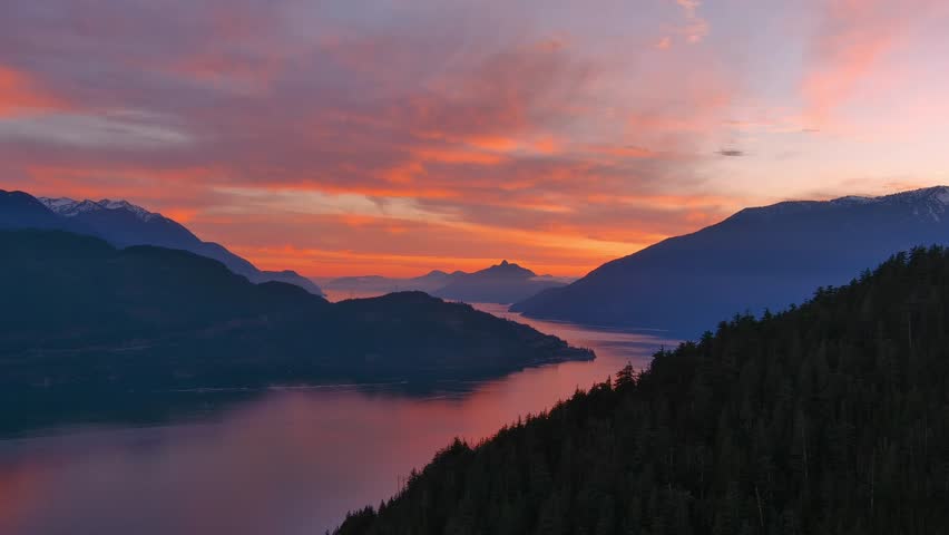 Scenic Mountain Landscape and Trees in Howe Sound. Fall Season, Dramatic Sunset. Howe Sound, British Columbia Canada. Royalty-Free Stock Footage #3399496173