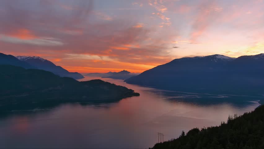 Scenic Mountain Landscape and Trees in Howe Sound. Fall Season, Dramatic Sunset. Howe Sound, British Columbia Canada. Royalty-Free Stock Footage #3399496305