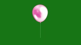 Footage of floating decorative balloons. Party balloons, with green screen background.