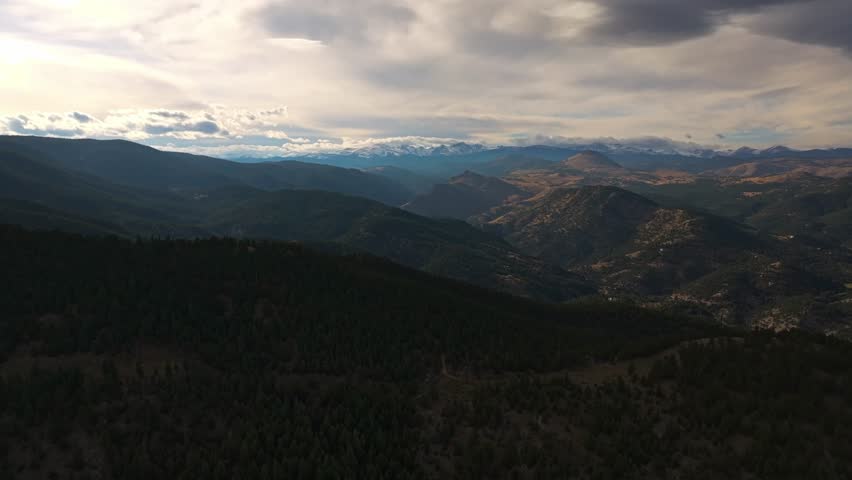 Cinematic dolly tilt up to Lost Gulch Overlook Boulder Colorado under grey stormy skies