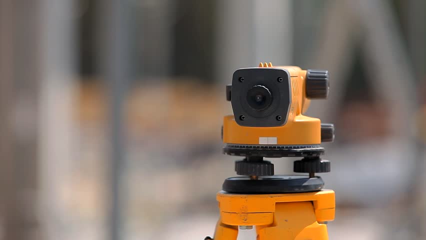 Professional total station. Construction equipment. Geodesy at a construction site. Royalty-Free Stock Footage #3399734279