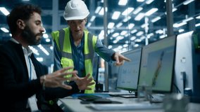 Car Factory Office: Latin Male Auto Engineer Showing Transmission 3D Render To Caucasian Female Automotive Production Supervisor On Computer. Automated Robot Arm Assembly Line Manufacturing Vehicles. - Powered by Shutterstock - Get 15% off with code: PIKWIZARD15