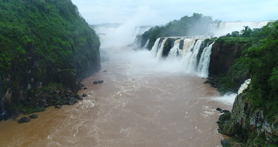 Captivating aerial view of the breathtaking Iguazu Falls, a natural wonder straddling the border between Argentina and Brazil.