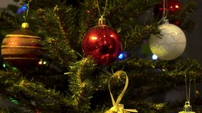 New Year tree close-up. The video conveys the spirit of Christmas, New Year's mood, preparation for the New Year and the homeliness of a family holiday.