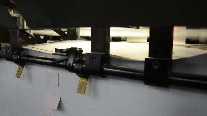 closeup of offset machine into print-shop. Final  storage department of the