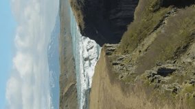 Gullfoss Waterfall. Iceland. Aerial View. Drone Flies Forward. Reveal Shot. Vertical Video