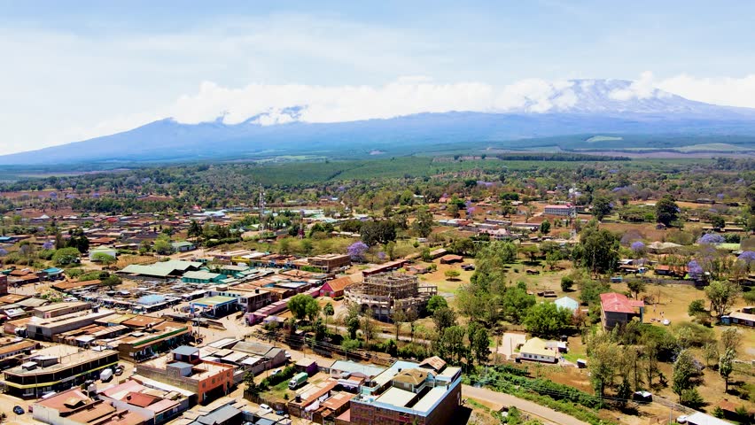 rural village town of kenya with kilimanjaro in the background. Aerial cityscape Mount Kilimanjaro.