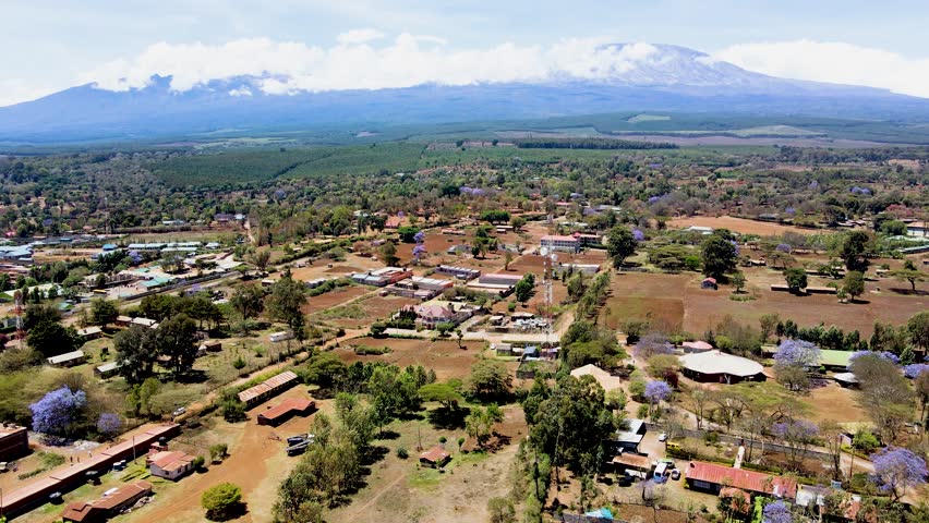 rural village town of kenya with kilimanjaro in the background. Aerial cityscape Mount Kilimanjaro.