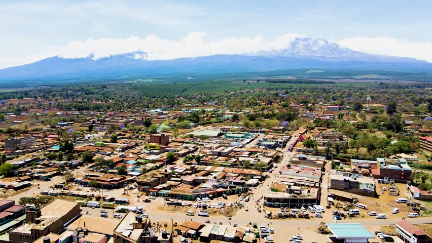 rural village town of kenya with kilimanjaro in the background. Aerial cityscape Mount Kilimanjaro.