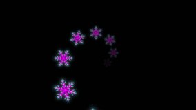 Vibrant Neon Snowflakes endlessly fly towards the viewer in this never ending spiral video loop.