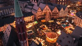 Christmas Market on Romerberg Square in Evening, Frankfurt am Main, Hesse, Germany. Aerial Drone Shot Weihnachtsmarkt - Powered by Shutterstock - Get 15% off with code: PIKWIZARD15