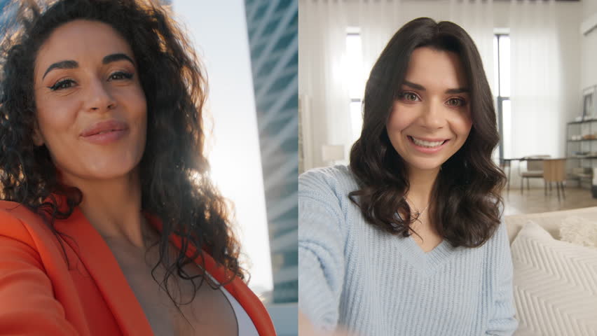 Curly girls waving hand hello using smartphone talking online to mobile phone. Webcam view selfie call communicating with friend. Gorgeous women on split screen speaking on video call to front webcam Royalty-Free Stock Footage #3400223803
