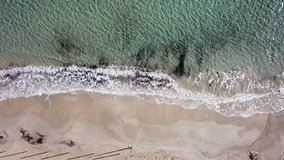 Aerial drone video of tropical beach as seen from above