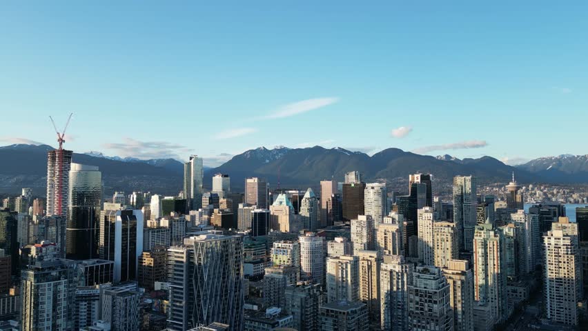 Vancouver skyline at sunset from False creek, drone aerial