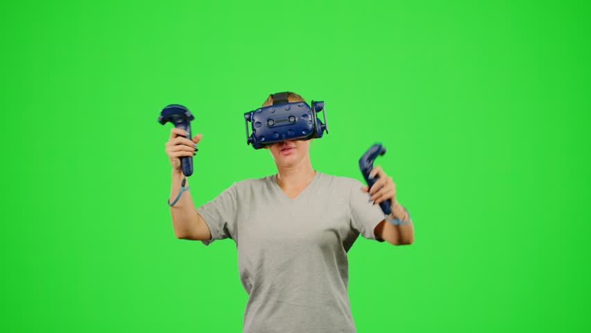 The woman design artist VR headset creation 3d virtual reality world. The girl in cyberspace get immersive experience on chroma key green screen. Concept 3d VR immersive experience in virtual reality Royalty-Free Stock Footage #3400508013